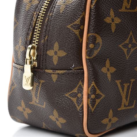 louis vuitton monogram toilet bag.